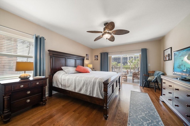 bedroom featuring dark wood-style floors, access to outside, and a ceiling fan