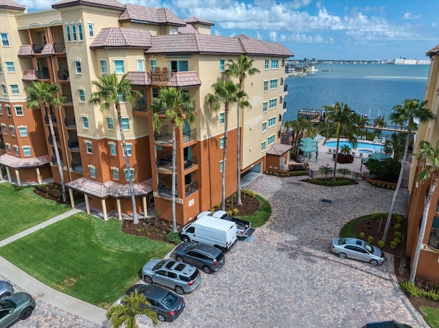 view of building exterior with a water view