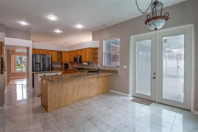 kitchen with open shelves, dark stone counters, a peninsula, stainless steel appliances, and marble finish floor