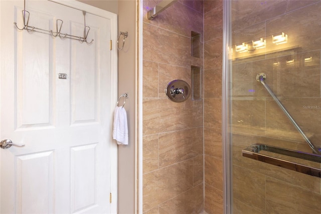 bathroom featuring a shower stall