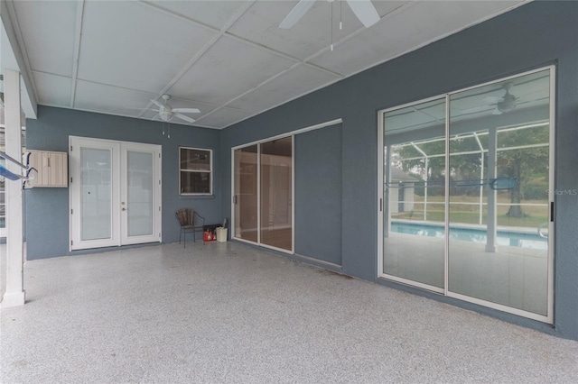 view of patio featuring a ceiling fan and french doors