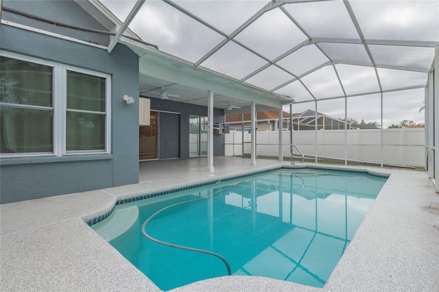 view of swimming pool with a patio, fence, and a fenced in pool