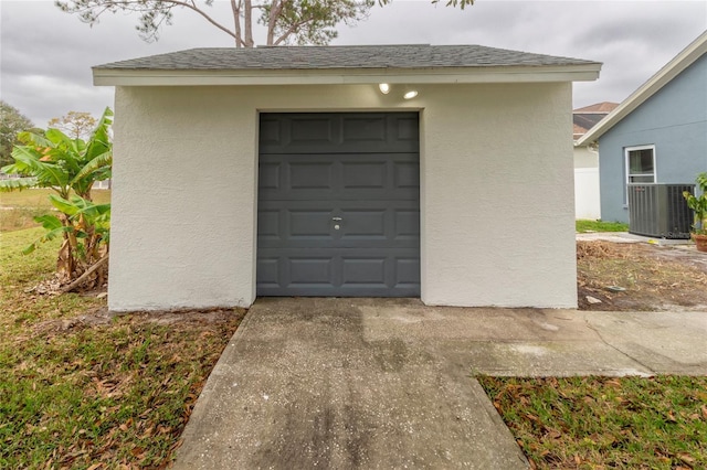 garage featuring central AC unit