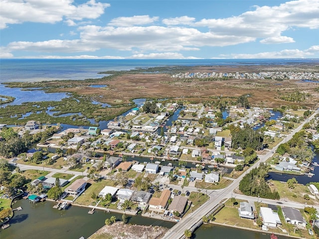 aerial view featuring a water view and a residential view