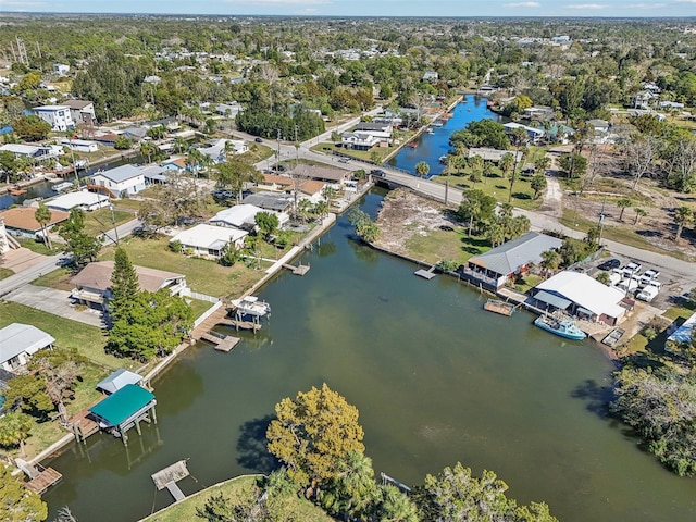 bird's eye view with a water view and a residential view