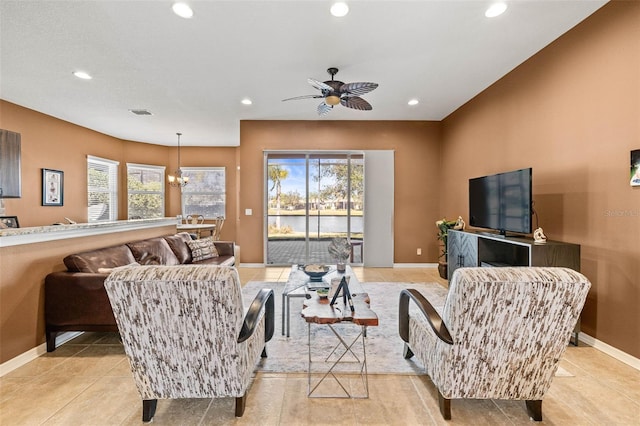 living area with light tile patterned floors, baseboards, and recessed lighting