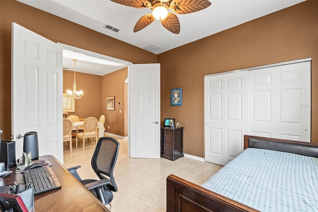 bedroom featuring light tile patterned floors, baseboards, visible vents, a closet, and ceiling fan with notable chandelier