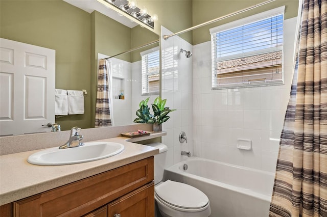 full bathroom with toilet, shower / tub combo, and vanity