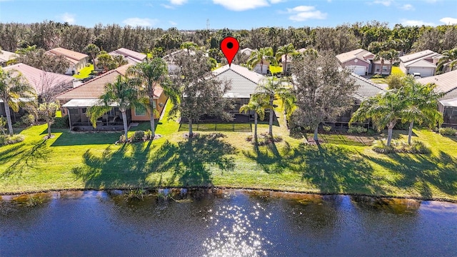 birds eye view of property featuring a water view