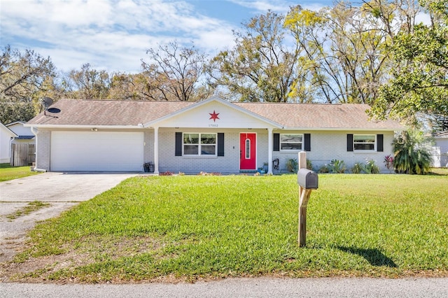 ranch-style home featuring an attached garage, brick siding, concrete driveway, and a front yard