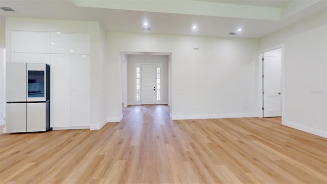 interior space with visible vents, recessed lighting, baseboards, and light wood-style floors