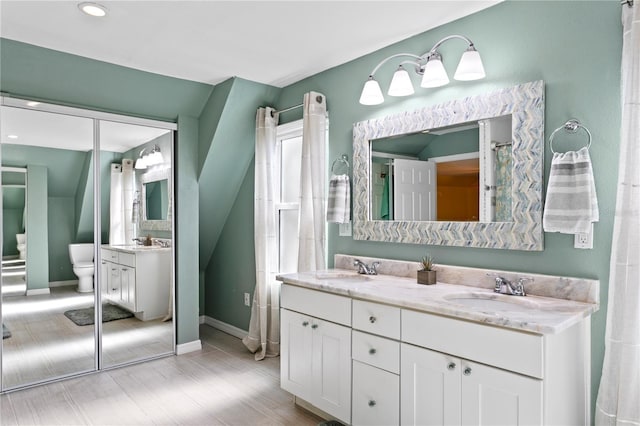 bathroom with double vanity and a sink