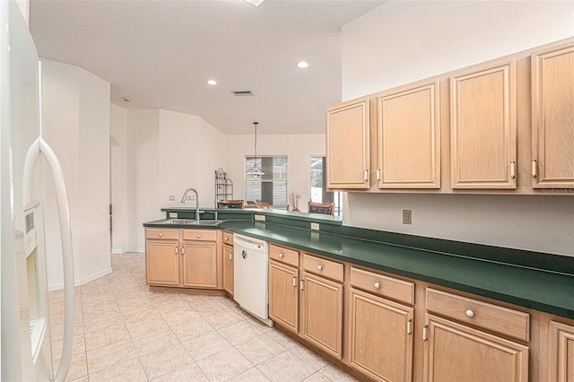 kitchen with light tile patterned floors, dark countertops, recessed lighting, a sink, and white appliances