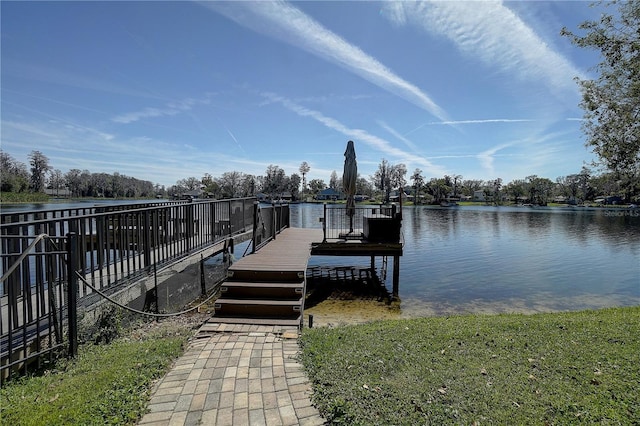 dock area featuring a water view