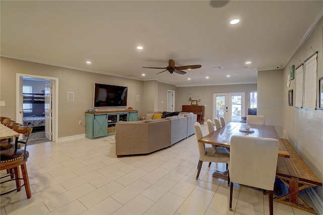dining area with recessed lighting, french doors, crown molding, and baseboards