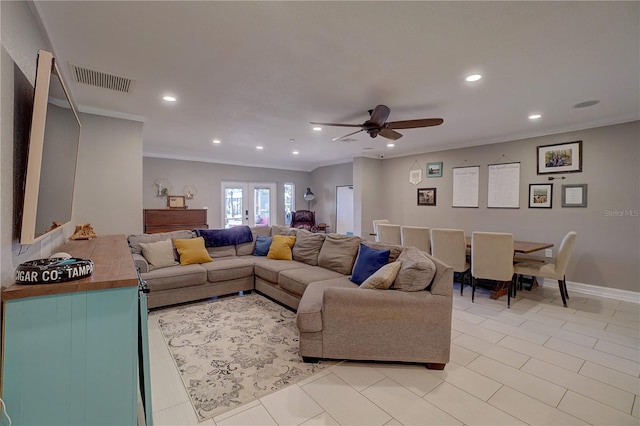 living area featuring ceiling fan, recessed lighting, visible vents, baseboards, and ornamental molding