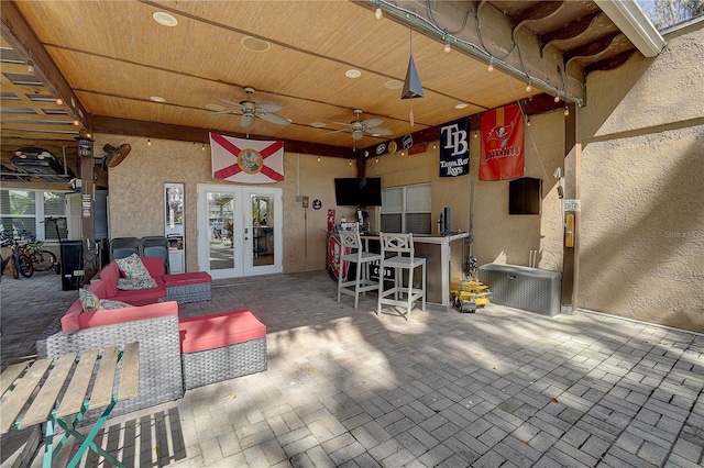 view of patio / terrace featuring french doors and a ceiling fan