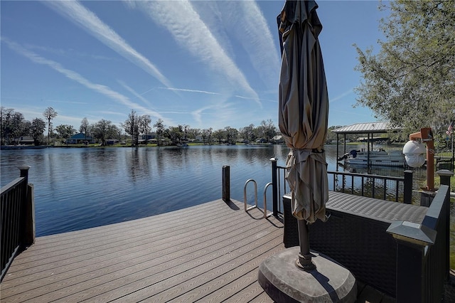 dock area featuring a water view