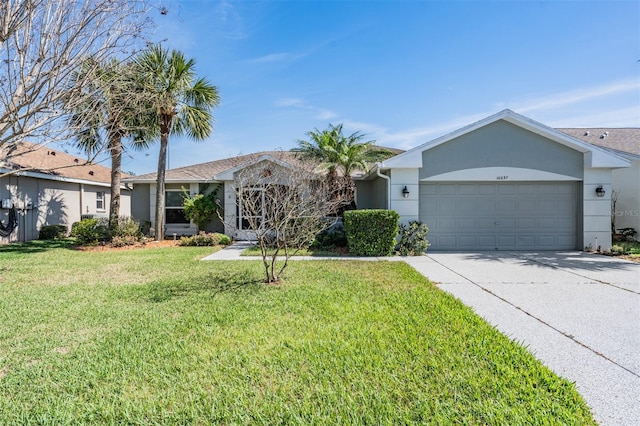 ranch-style home featuring an attached garage, a front lawn, concrete driveway, and stucco siding