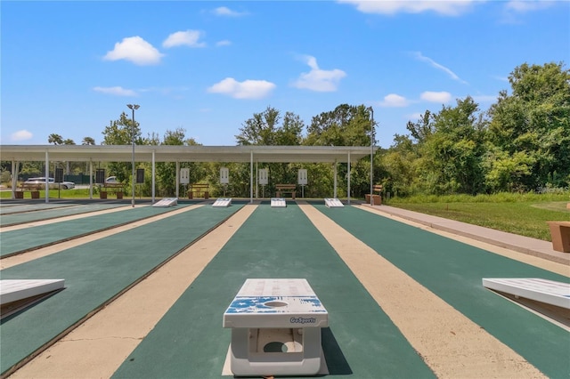 view of home's community featuring shuffleboard