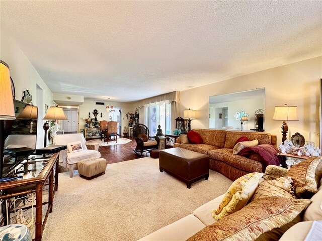 2630 Pearce Dr Unit 107, Clearwater, FL 33764 - carpeted living area with a textured ceiling