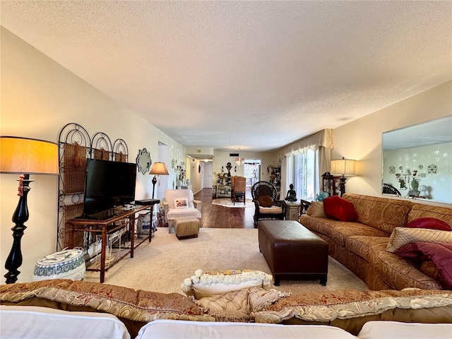 2630 Pearce Dr Unit 107, Clearwater, FL 33764 - living room with a textured ceiling and carpet