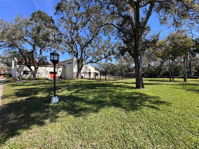2630 Pearce Dr Unit 107, Clearwater, FL 33764 - view of yard featuring fence