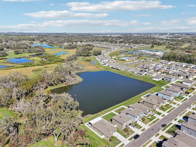 aerial view featuring a residential view and a water view