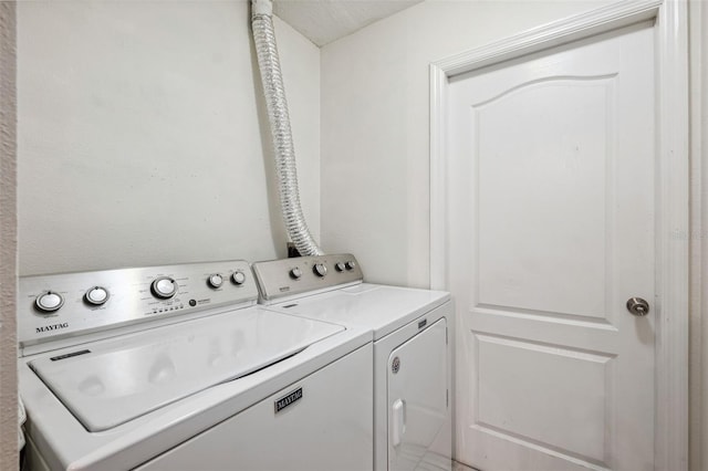 laundry area featuring laundry area and independent washer and dryer