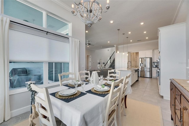 dining area featuring ornamental molding, ceiling fan with notable chandelier, recessed lighting, and stairs