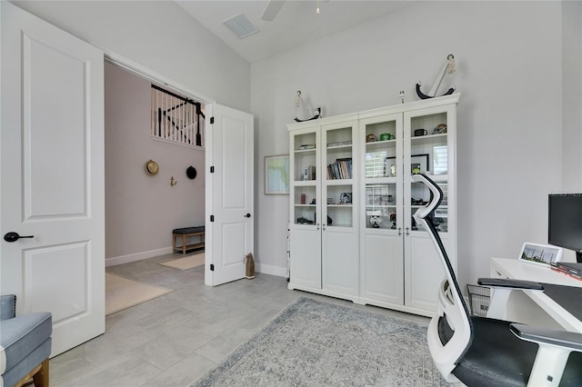 home office featuring visible vents, ceiling fan, and baseboards