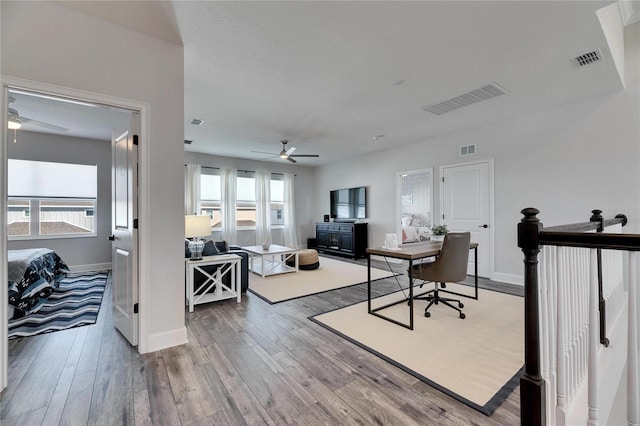 office featuring visible vents and hardwood / wood-style floors