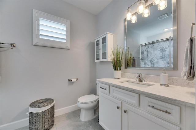 full bath with baseboards, visible vents, toilet, tile patterned floors, and vanity