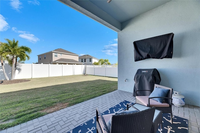 view of patio / terrace with a fenced backyard and area for grilling