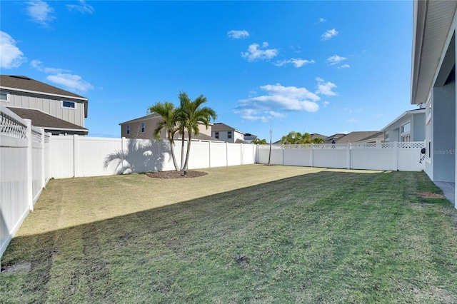 view of yard featuring a fenced backyard