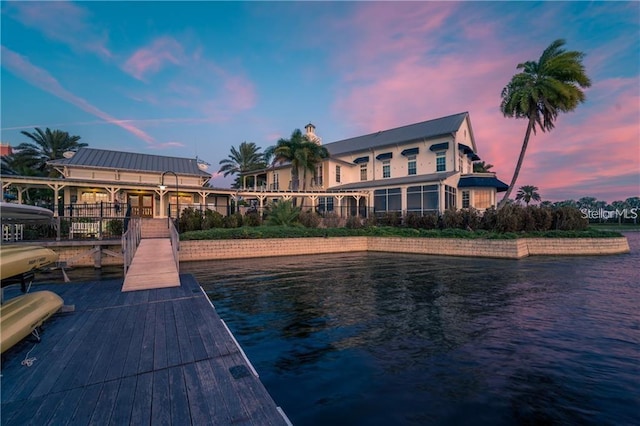 dock area with a water view