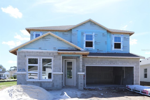 unfinished property with an attached garage