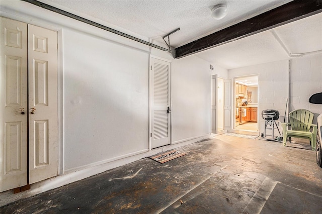 interior space featuring concrete block wall