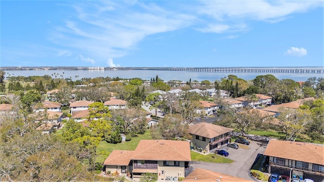 aerial view with a residential view and a water view