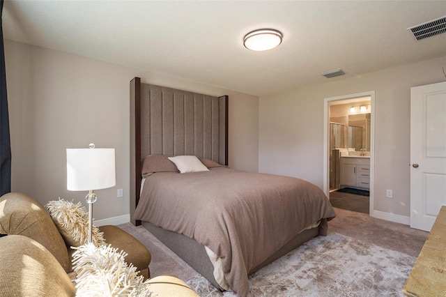 bedroom featuring light colored carpet, visible vents, and baseboards