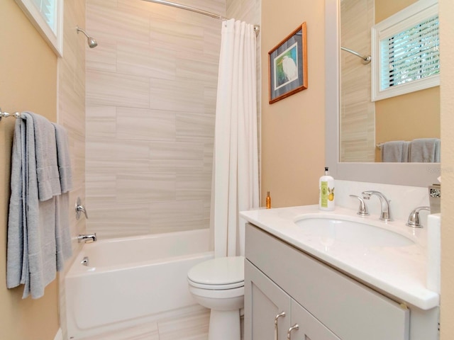 full bath with toilet, shower / bath combination with curtain, and vanity