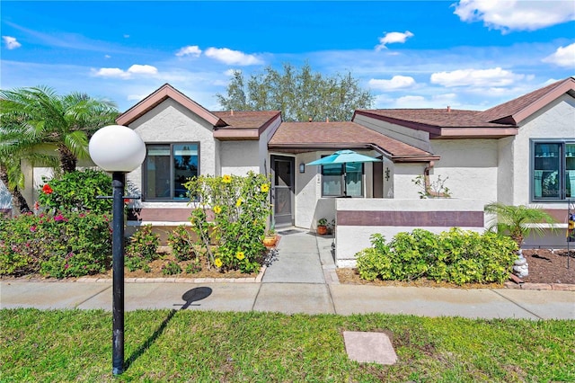 view of front of home with stucco siding