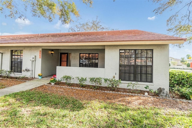 view of front of property featuring stucco siding