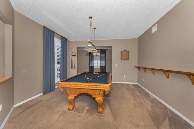 recreation room with carpet floors, baseboards, and visible vents