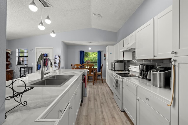 kitchen featuring white cabinets, decorative light fixtures, light countertops, white electric range, and under cabinet range hood