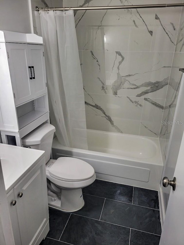 full bathroom featuring shower / bath combination with curtain, tile patterned flooring, vanity, and toilet