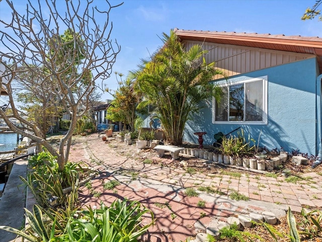 exterior space with stucco siding