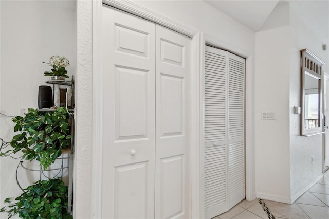 interior space featuring baseboards