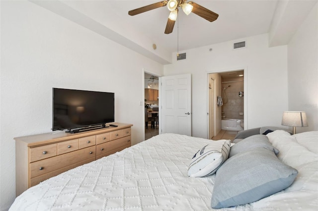 bedroom featuring ceiling fan, connected bathroom, and visible vents