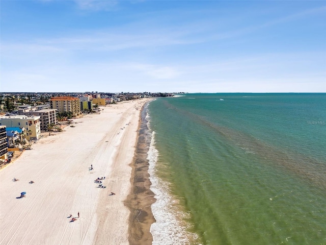 bird's eye view featuring a water view and a view of the beach